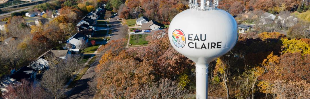 Eau Claire Water Tower with a fall backdrop