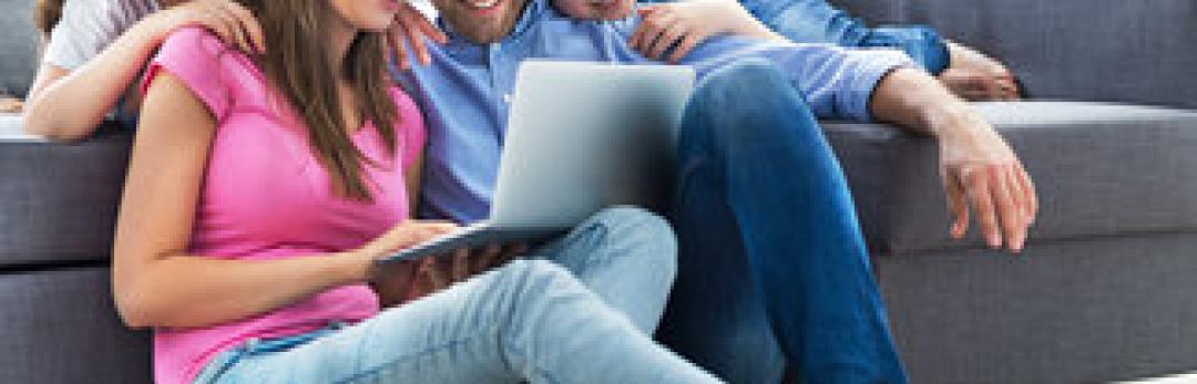 lifeline + united way - family sitting together using internet