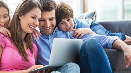 lifeline + united way - family sitting together using internet