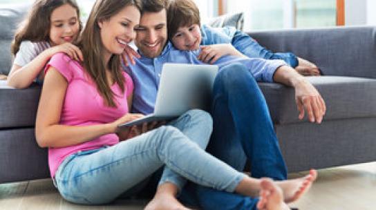 lifeline + united way - family sitting together using internet