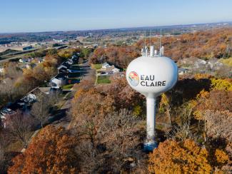 Eau Claire Water Tower with a fall backdrop