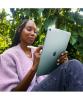 A woman using the iPad Air.